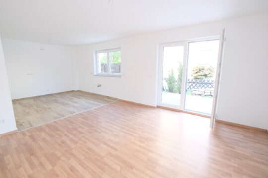 Wohnzimmer mit integrierter Küche