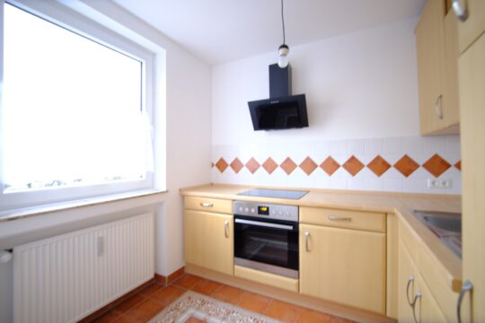 Küche mit Einbauküche